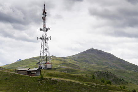 Telecommunication tower with Monte della Neve in background, Livignoの写真素材