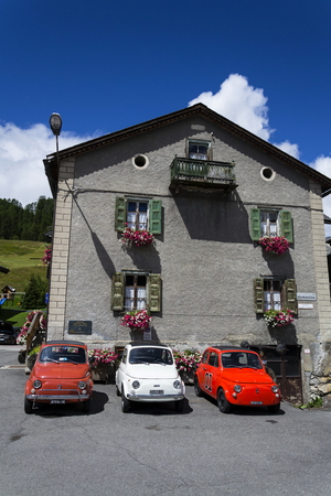 LIVIGNO, ITALY - AUGUST 1: Three vintage cars stand on street on 1 August 2016 in Livigno, Italy.のeditorial素材