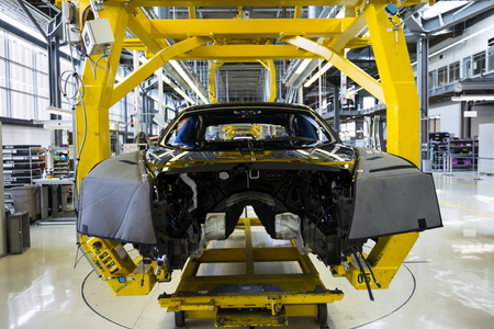 WESTHAMPNETT, UNITED KINGDOM - AUGUST 11: Rolls-Royce cars stand on production line in Goodwood factory on August 11, 2016 in Westhampnett, United Kingdom. Rolls-Royce skips Paris Motor Show.のeditorial素材