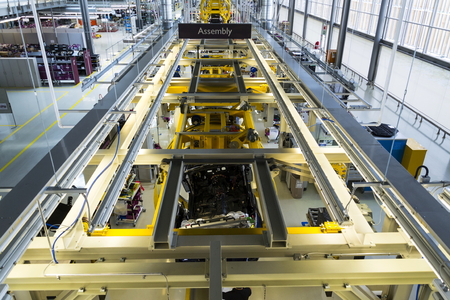 WESTHAMPNETT, UNITED KINGDOM - AUGUST 11: Rolls-Royce cars stand on production line in Goodwood factory on August 11, 2016 in Westhampnett, United Kingdom. Rolls-Royce skips Paris Motor Show.のeditorial素材