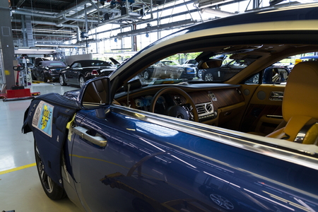WESTHAMPNETT, UNITED KINGDOM - AUGUST 11: Rolls-Royce cars stand on production line in Goodwood factory on August 11, 2016 in Westhampnett, United Kingdom. Rolls-Royce skips Paris Motor Show.のeditorial素材