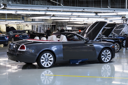 WESTHAMPNETT, UNITED KINGDOM - AUGUST 11: Rolls-Royce cars stand on production line in Goodwood factory on August 11, 2016 in Westhampnett, United Kingdom. Rolls-Royce skips Paris Motor Show.のeditorial素材