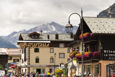 LIVIGNO, ITALY - AUGUST 1: Tourists shopping on the streets of duty-free area on 1 August 2016 in Livigno, Italy.のeditorial素材