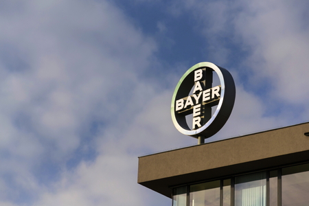 PRAGUE, CZECH REPUBLIC - NOVEMBER 7: Bayer pharmaceutical company logo on the building of Czech headquarters on November 7, 2016 in Prague, Czech republic.のeditorial素材