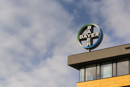 PRAGUE, CZECH REPUBLIC - NOVEMBER 7: Bayer pharmaceutical company logo on the building of Czech headquarters on November 7, 2016 in Prague, Czech republic.のeditorial素材