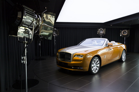 WESTHAMPNETT, UNITED KINGDOM - AUGUST 11: Rolls-Royce Dawn stands in showroom at the Goodwood car factory on August 11, 2016 in Westhampnett, United Kingdom. Rolls-Royce unveils new fashion inspired Dawn Couture collection.のeditorial素材