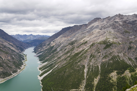 Aerial view of Livigno lake in Alps Mountains, Lombardy, Italyの写真素材