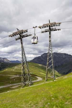 LIVIGNO, ITALY - AUGUST 3: Cabin lift in mountain bikepark Mottolino on 3 August 2016 in Livigno, Italy.のeditorial素材