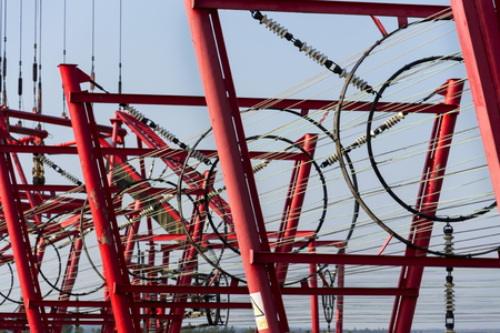 Communication wires lead to switching station from radio transmitter towerの写真素材