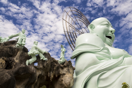 Laughing Buddha statue near Linh An Tu Temple, Dalat, Vietnamの写真素材