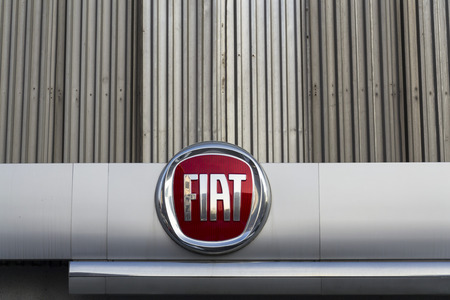 PRAGUE, CZECH REPUBLIC - JANUARY 20: Fiat group company logo on dealership building on January 20, 2017 in Prague, Czech republic. American regulator EPA investigate Fiat Chrysler for emissions cheating.のeditorial素材