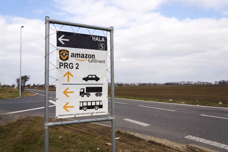 DOBROVIZ, CZECH REPUBLIC - MARCH 12: Road sign to online retailer company Amazon fulfillment logistics building on March 12, 2017 in Dobroviz, Czech republic. Amazon is the No. 1 Site For Millennial Clothes Shoppers.のeditorial素材