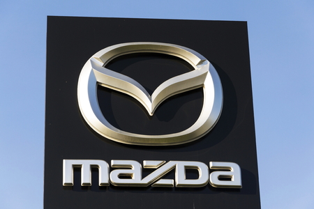 PRAGUE, CZECH REPUBLIC - MARCH 31: Mazda car company logo in front of dealership building on March 31, 2017 in Prague, Czech republic. Mazda set to launch new electric vehicle range by 2019.のeditorial素材