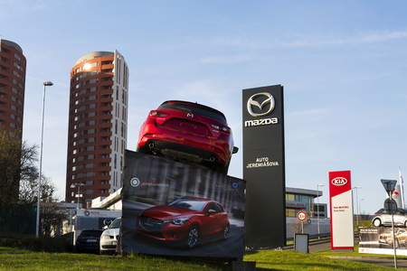 PRAGUE, CZECH REPUBLIC - MARCH 31: Mazda 3 car in front of dealership building on March 31, 2017 in Prague, Czech republic. Mazda set to launch new electric vehicle range by 2019.のeditorial素材