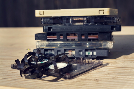 Old broken unwound compact cassette audio tape messed upの写真素材