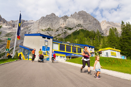 RAMSAU AM DACHSTEIN, AUSTRIA - AUGUST 17: Tourists in front of the lower station of the Dachstein cable car on August 17, 2017 in Schladming, Austria.のeditorial素材