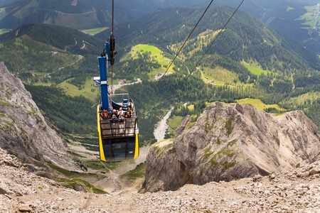 RAMSAU AM DACHSTEIN, AUSTRIA - AUGUST 17: Tourists on top of gondola in the upper station of the Dachstein cable car on August 17, 2017 in Schladming, Austria.のeditorial素材
