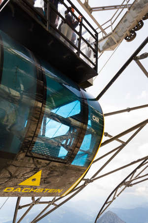 RAMSAU AM DACHSTEIN, AUSTRIA - AUGUST 17: Gondola with tourists in the upper station of the Dachstein cable car on August 17, 2017 in Schladming, Austria.の写真素材