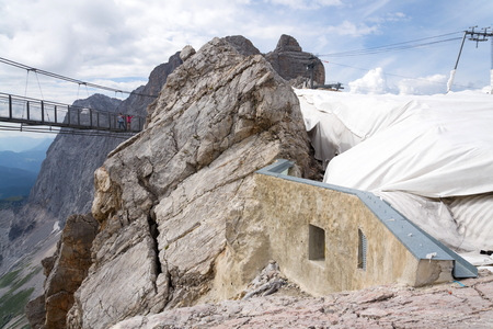 RAMSAU AM DACHSTEIN, AUSTRIA - AUGUST 17: Tourists walk on the Austrias highest suspension bridge Dachstein Suspension bridge on August 17, 2017 in Ramsau am Dachstein, Austria.のeditorial素材