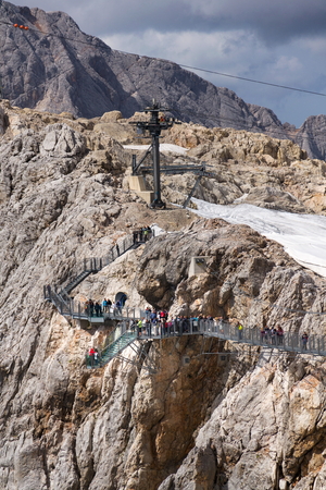 RAMSAU AM DACHSTEIN, AUSTRIA - AUGUST 17: Tourists walk on the Austrias highest suspension bridge Dachstein Suspension bridge on August 17, 2017 in Ramsau am Dachstein, Austria.のeditorial素材
