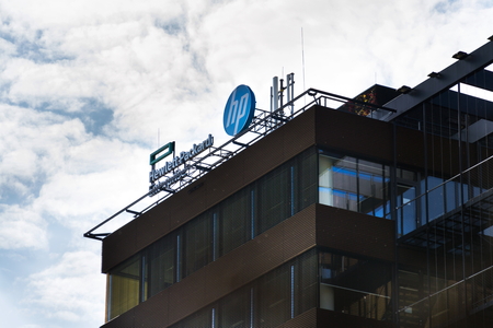 PRAGUE, CZECH REPUBLIC - OCTOBER 14: The Hewlett-Packard company logo on headquarters building on October 14, 2017 in Prague, Czech republic. HP unveils worlds most powerful and first detachable PC workstation.のeditorial素材