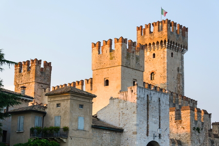 The Scaliger Castle in Sirmione, Italy during sunsetのeditorial素材