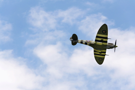 PLASY, CZECH REPUBLIC - APRIL 30: Supermarine Spitfire fighter aircraft used by british Royal Air Force fly on April 30, 2017 in Plasy, Czech republic.のeditorial素材