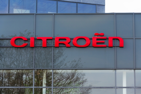 PRAGUE, CZECH REPUBLIC - NOVEMBER 5: Citroen car company company logo in front of dealership building on November 5, 2017 in Prague. Citroen prepares EV push with 80 per cent electrified range by 2023.のeditorial素材