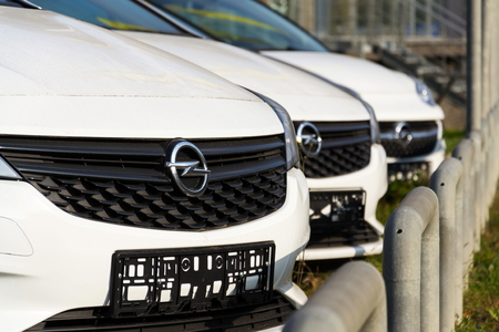 PRAGUE, CZECH REPUBLIC - NOVEMBER 5: Opel cars in front of dealership building on November 5, 2017 in Prague. PSA Group plans to cut the number of models and rein in discounts at its Opel division.のeditorial素材