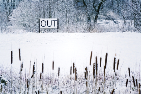 Out sing in snowy landscape, Hello spring, goodbye winter conceptの写真素材