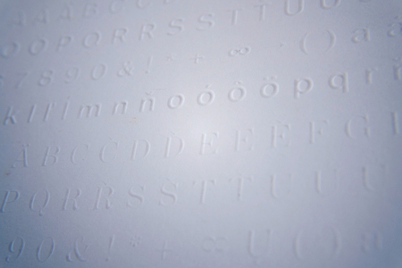 Embossed writing for blind people used before Braille writing system