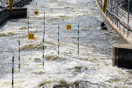 PRAGUE, CZECH REPUBLIC - JUNE 11 2017: People in canoe slalom course on Prague-Troje canoeing centre on June 11, 2017 in Prague, Czech Republic.のeditorial素材