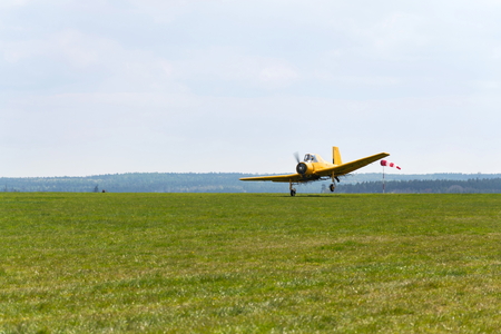 PLASY, CZECH REPUBLIC - APRIL 30: Zlin Z-37 Cmelak Czech agricultural airplane used as crop duster flying on April 30, 2017 in Plasy, Czech Republic.のeditorial素材