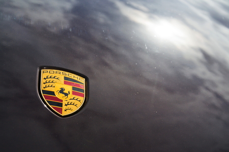 PRAGUE, CZECH REPUBLIC - MARCH 29 2018: Porsche automotive company logo on car bonnet on on March...