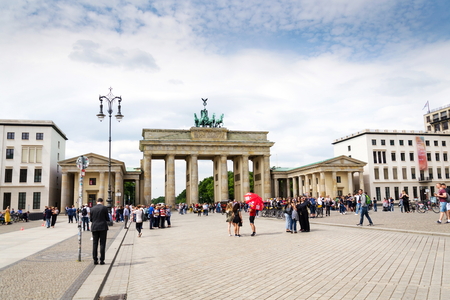 BERLIN, GERMANY - MAY 15 2018: Tourists taking pictures in front of Brandenburger Tor - Brandeburg gate on May 15, 2018 in Berlin, Germany.のeditorial素材