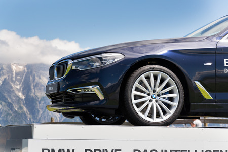 SAALBACH-HINTERGLEMM, AUSTRIA - JUNE 20 2018: BMW 530d xDrive Limousine standing on top of Wildenkarkogel Mountain on June 20, 2018 in Saalbach-Hinterglemm, Austria.のeditorial素材