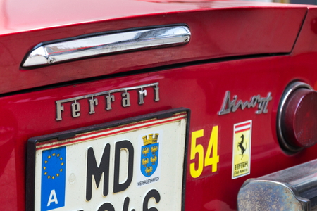 SAALBACH-HINTERGLEMM, AUSTRIA - JUNE 21 2018: Ferrari Dino oldsmobile vintage veteran cars preparing for Saalbach Classic rally on June 21, 2018 in Saalbach-Hinterglemm, Austria.のeditorial素材