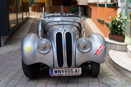 SAALBACH-HINTERGLEMM, AUSTRIA - JUNE 21 2018: Vintage car BMW 328 roadster oldsmobile veteran...