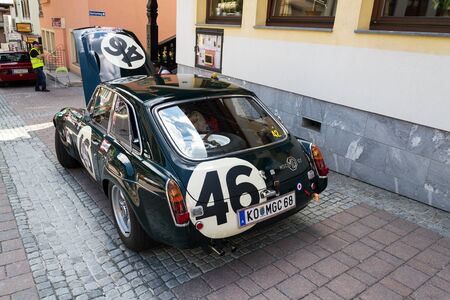 SAALBACH-HINTERGLEMM, AUSTRIA - JUNE 21 2018: Vintage car MG MGC GT coupe oldsmobile veteran stands on June 21, 2018 in Saalbach-Hinterglemm, Austria.のeditorial素材