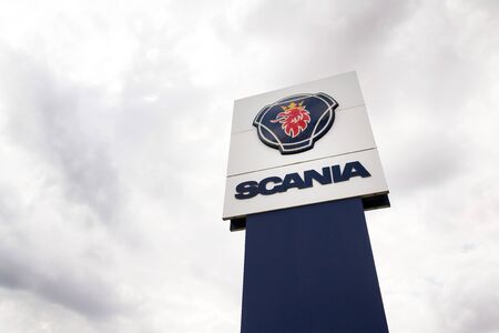 PRAGUE, CZECH REPUBLIC - AUGUST 15 2018: Scania AB Swedish company logo on service dealership headquarters on August 15, 2018 in Prague, Czech Republic.のeditorial素材