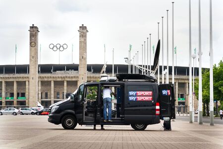BERLIN, GERMANY - MAY 15 2018: Sky Sports television production truck stands in front of  stadium from 1936 on May 15, 2018 in Berlin, Germany.のeditorial素材