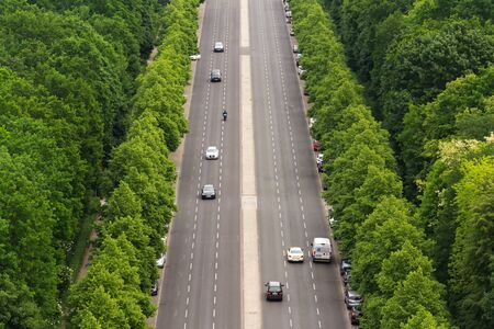 BERLIN, GERMANY - MAY 15 2018: Aerial view of cars passing crossroad under Victory Column in Tiergarten on May 15, 2018 in Berlin, Germany.のeditorial素材