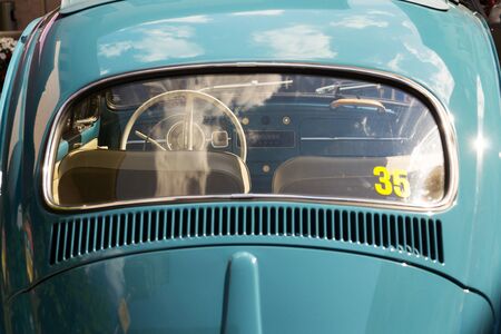 SAALBACH-HINTERGLEMM, AUSTRIA - JUNE 21 2018: Vintage car Volkswagen Beetle oldsmobile veteran on...