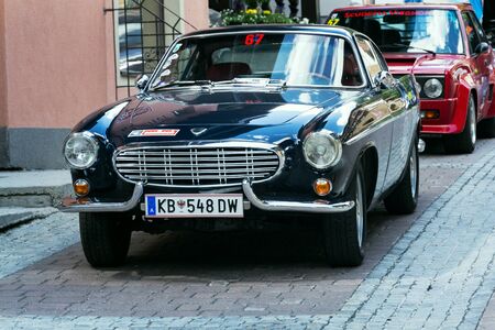 SAALBACH-HINTERGLEMM, AUSTRIA - JUNE 21 2018: Vintage car Volvo P 1800 S oldsmobile veteran produced between 1961 and 1973 stands on June 21, 2018 in Saalbach-Hinterglemm, Austria.のeditorial素材