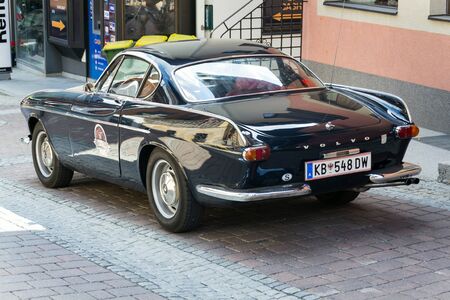 SAALBACH-HINTERGLEMM, AUSTRIA - JUNE 21 2018: Vintage car Volvo P 1800 S oldsmobile veteran produced between 1961 and 1973 stands on June 21, 2018 in Saalbach-Hinterglemm, Austria.のeditorial素材