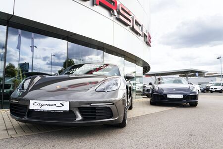 PRAGUE, CZECH REPUBLIC - SEPTEMBER 22 2018: Cars in front of Porsche automotive company dealership buildin on September 22, 2018 in Prague, Czech Republic.のeditorial素材