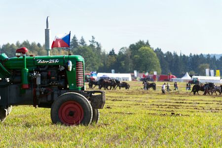 KAMENICE NAD LIPOU, CZECH REPUBLIC - OCTOBER 6 2018: Plowing vintage veteran tractors on field on ploughing championship on October 6, 2018 in Kamenice nad Lipou, Czech Republic.のeditorial素材