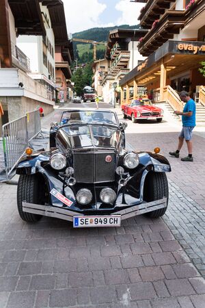 SAALBACH-HINTERGLEMM, AUSTRIA - JUNE 21 2018: Vintage car Clenet oldsmobile veteran roadster produced in 1970s stands on June 21, 2018 in Saalbach-Hinterglemm, Austria.のeditorial素材