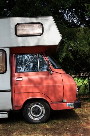 DOLNI KALNA, CZECH REPUBLIC - AUGUST 25 2018: Vintage car Skoda 1203 oldsmobile veteran adapted as caravan for living stands on August 25, 2018 in Dolni Kalna, Czech Republic.のeditorial素材