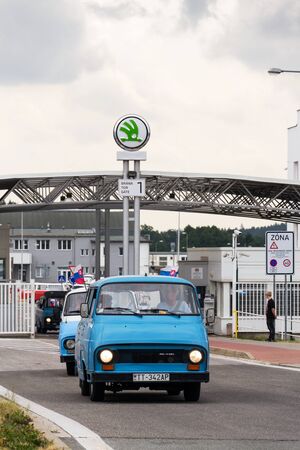 VRCHLABI, CZECH REPUBLIC - AUGUST 25 2018: Vintage cars Skoda 1203 oldsmobile veterans leaving Vrchlabi Skoda plant on August 25, 2018 in Vrchlabi, Czech Republic.のeditorial素材